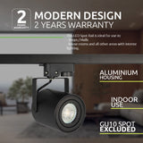 Schwarzer LED-Schienenstrahler mit Aluminiumgehäuse, von vorne und schräg unten fotografiert, montiert auf einer schwarzen Schiene in einem modernen Interieur-Ambiente; geeignet für den Innenbereich in Shops oder Wohnräumen. GU10-Leuchtmittel nicht im Lieferumfang enthalten.