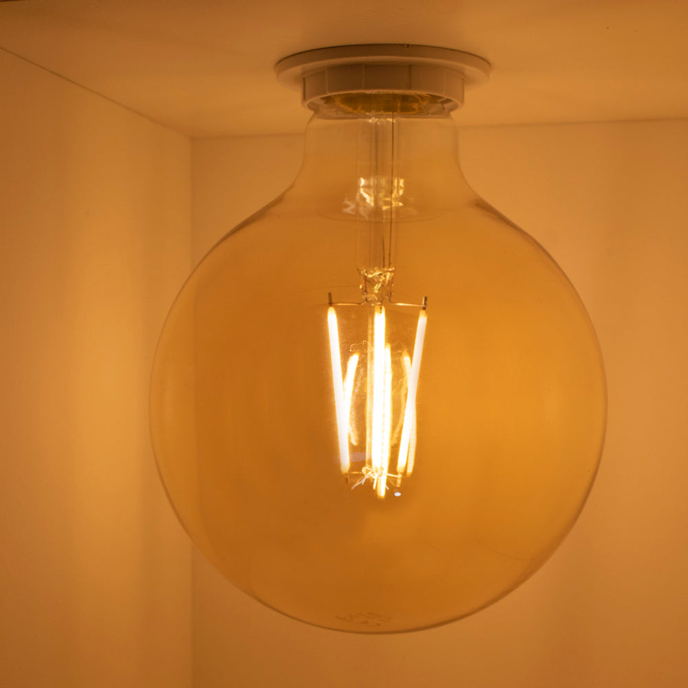 LED Filament Globe lamp-dimbaar-6W-Amber-E27 - 2700K-vooraanzicht - lamp aan