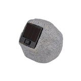 Seitenansicht einer grauen Solar-LED-Lampe in Form eines Natursteins mit eingebautem Solarpanel und Ein-/Ausschalter.