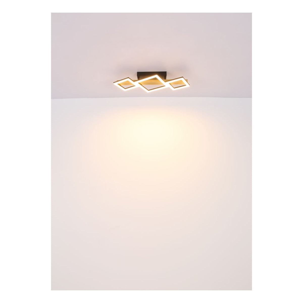 Moderne quadratische LED-Deckenleuchte im geometrischen Design, schwarzer Sockel mit warmweißem Licht, von unten betrachtet vor weißem Decken- und Wandhintergrund.