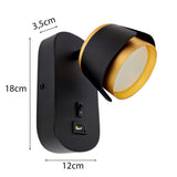Schwarz-goldene Wandleuchte mit USB-Anschluss und Schalter, Seitenansicht mit den Maßen 18 cm Höhe, 12 cm Breite und 3,5 cm Tiefe – moderne Wandbeleuchtung für das Schlafzimmer oder die Leseecke.