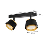 Schwarz-goldener Deckenstrahler mit zwei verstellbaren Lampenschirmen, moderner Industriestil, Maße 26 cm Breite, Lampenköpfe 10 cm Durchmesser, Seitenansicht.