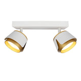 Moderner weißer Deckenstrahler mit zwei verstellbaren Lampen und goldfarbener Innenseite, Frontansicht.