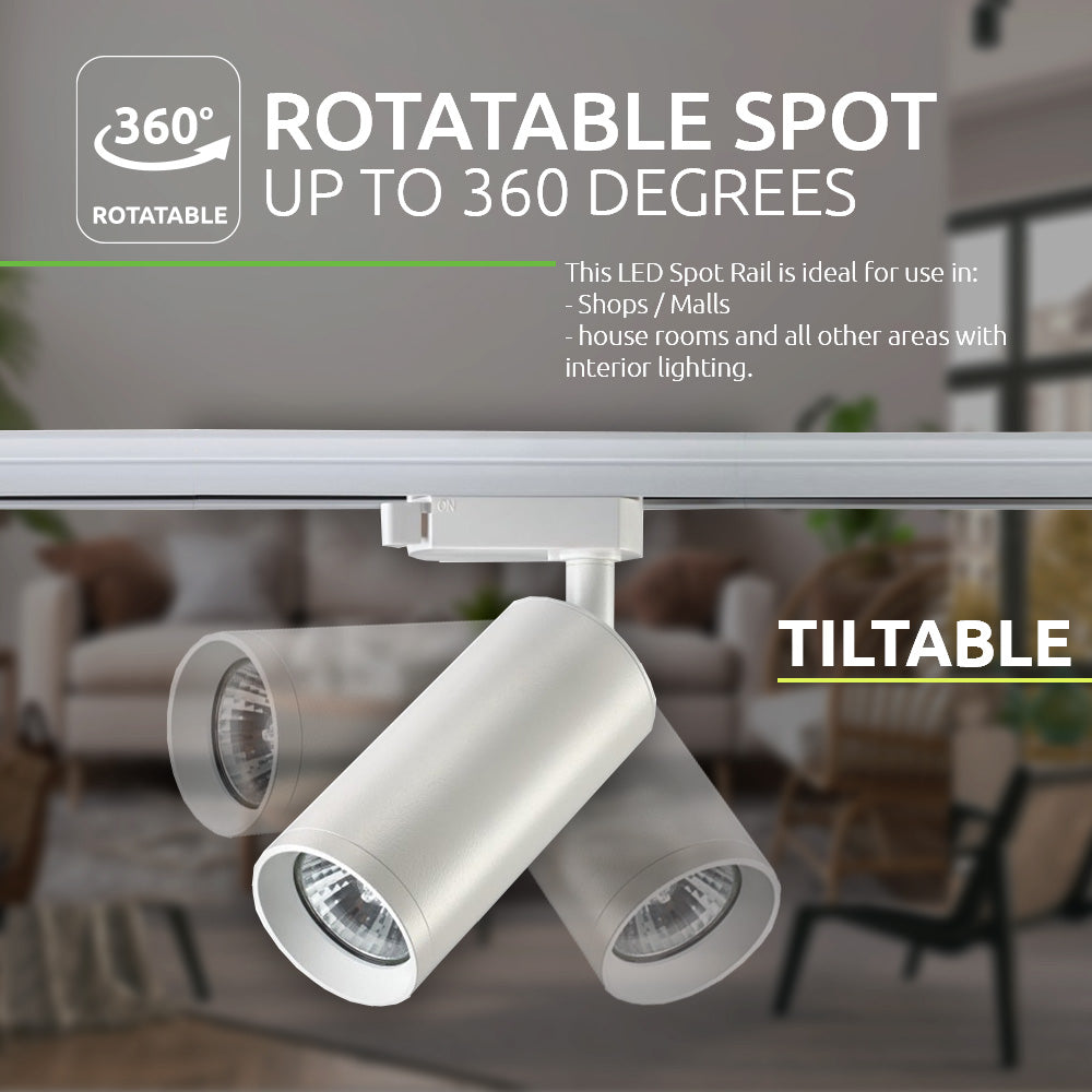 Weißes LED-Schienenstrahlersystem mit 360 Grad dreh- und schwenkbarem Strahler, Frontalansicht, montiert auf einer Deckenschiene, geeignet für die Innenbeleuchtung in Wohnungen, Geschäften und Einkaufszentren.