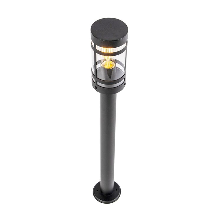 Moderne schwarze LED-Außensockelleuchte, zylindrisches Design mit Glasgehäuse und sichtbarer Lichtquelle, schräg von oben fotografiert.