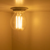 LED Filament bol lamp 4W | Dimbaar | E14 | 2700K - Warm wit - sfeerfoto lamp aan