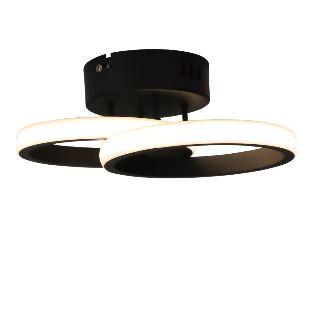 Moderne schwarze Deckenleuchte mit zwei überlappenden, runden LED-Lichtkreisen – von unten betrachtet erhält man einen guten Eindruck vom minimalistischen Design und der warmen Lichtabstrahlung.