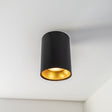 Opbouw spot armatuur zwart met goud 85 x 100mm Rond incl. GU10 fitting - warm wit licht - sfeerfoto