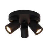 Schwarzer Deckenstrahler mit drei verstellbaren Lichtpunkten im modernen Stil, Vorderansicht mit eingeschaltetem Licht.