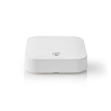 Vorderansicht eines weißen Nedis SmartLife Zigbee Gateway, eines kompakten Smart-Home-Geräts mit abgerundeten Ecken und einem mittig platzierten Logo, das zum Verbinden von Zigbee-Geräten mit einem Smart-Home-Netzwerk verwendet wird.