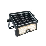 Solar-LED-Außenleuchte mit Bewegungsmelder – schräge Frontansicht der schwarzen Wandleuchte mit Solarpanel und integrierter LED-Beleuchtung.