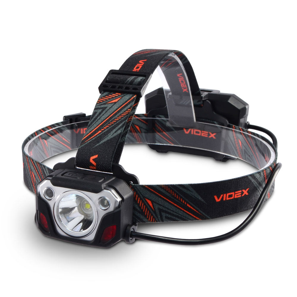 Vorderansicht der Videx-Stirnlampe mit verstellbarem elastischem Kopfband, leistungsstarkem LED-Licht und rückseitiger Batteriehalterung, geeignet für den Outdoor- und professionellen Einsatz.
